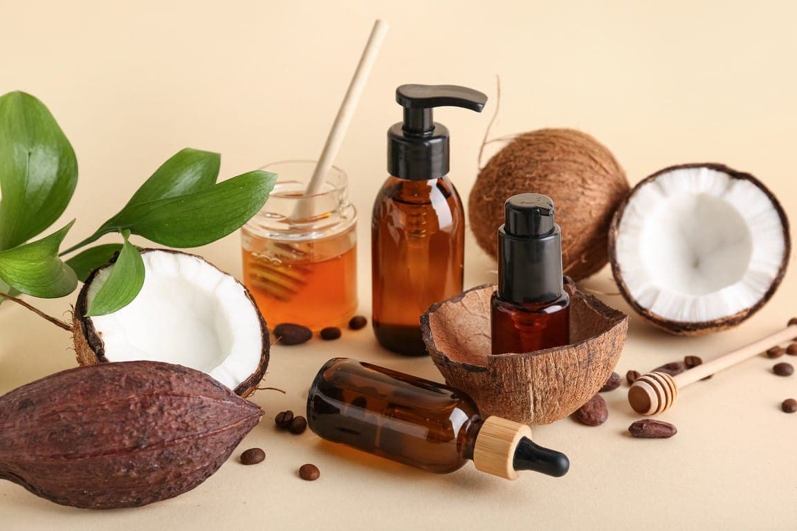 Coconut, cacao and amber cosmetic bottles